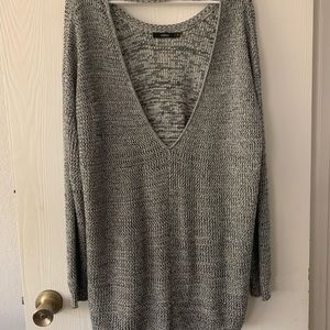 Gray speckled and knitted sweater